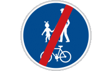 Dopravní značka „Konec stezky pro chodce a cyklisty společné“ (č. C 9b) ukončuje platnost značky „Stezka pro chodce a cyklisty společná“ (č. C 9a). TestImage